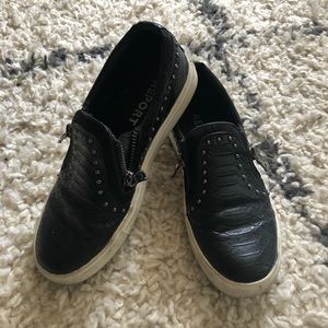 Black snakeskin sneakers